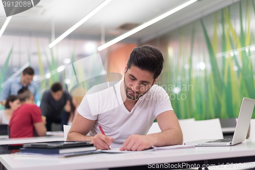 Image of male student in classroom