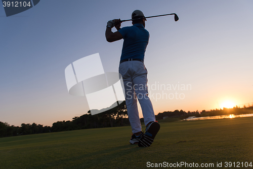 Image of golfer hitting long shot