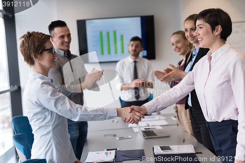 Image of business womans handshake