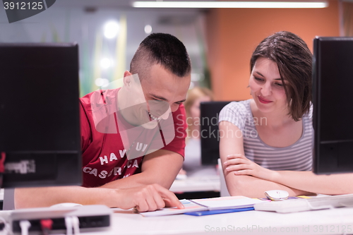 Image of technology students group working  in computer lab school  class