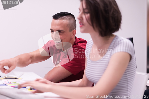 Image of technology students group working  in computer lab school  class