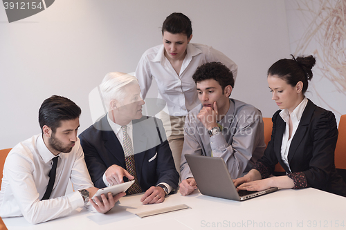 Image of business people group on meeting at modern startup office