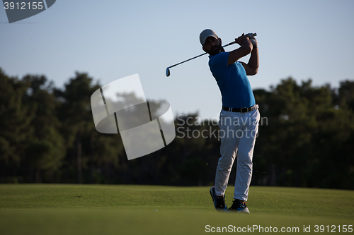 Image of golfer hitting long shot