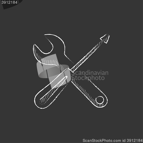 Image of Screwdriver and wrench tools. Drawn in chalk icon.