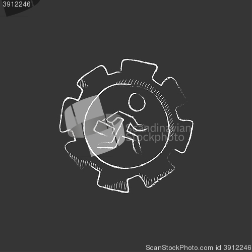 Image of Man running inside the gear. Drawn in chalk icon.