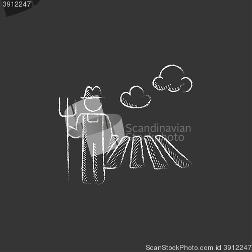 Image of Farmer with pitchfork. Drawn in chalk icon.