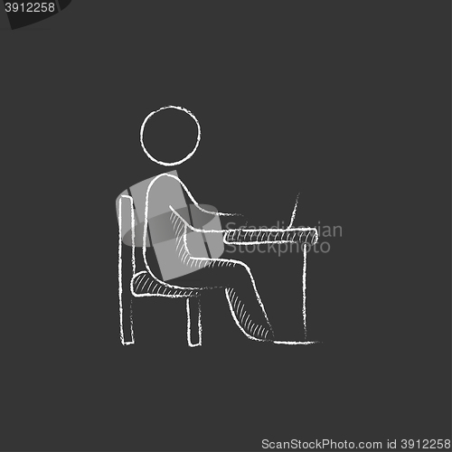 Image of Businessman working at his laptop. Drawn in chalk icon.