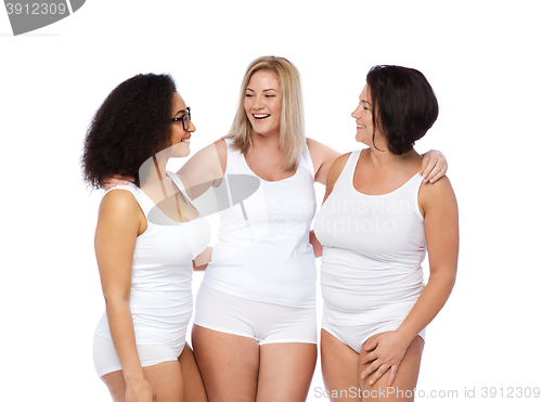 Image of group of happy plus size women in white underwear