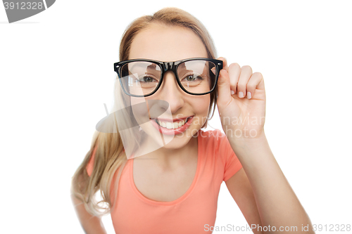 Image of happy young woman or teenage girl in eyeglasses