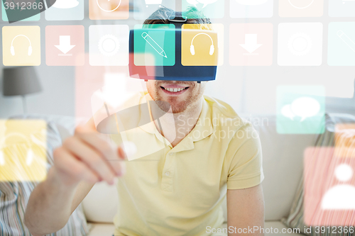 Image of young man in virtual reality headset or 3d glasses