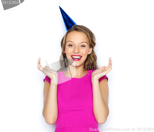 Image of happy young woman or teen girl in party cap