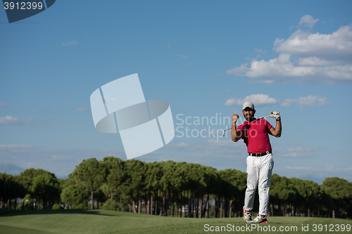 Image of golf player hitting long shot