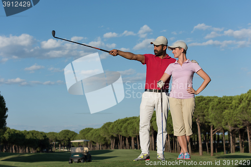 Image of portrait of couple on golf course