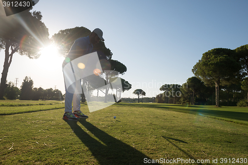 Image of golf player hitting shot