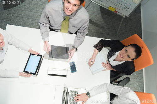 Image of aerial view of business people group brainstorming on meeting