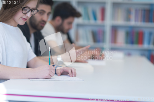 Image of group of students study together in classroom