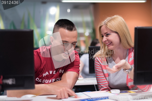 Image of technology students group working  in computer lab school  class