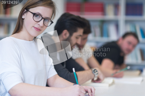 Image of group of students study together in classroom