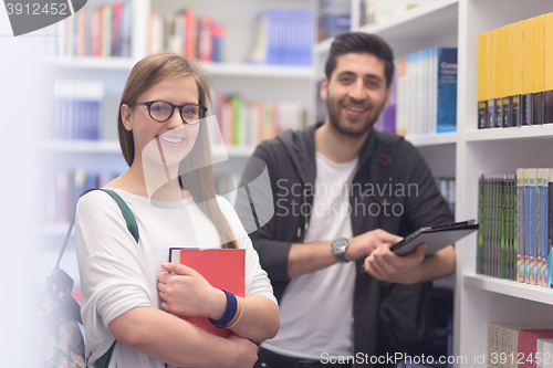 Image of students group  in school  library