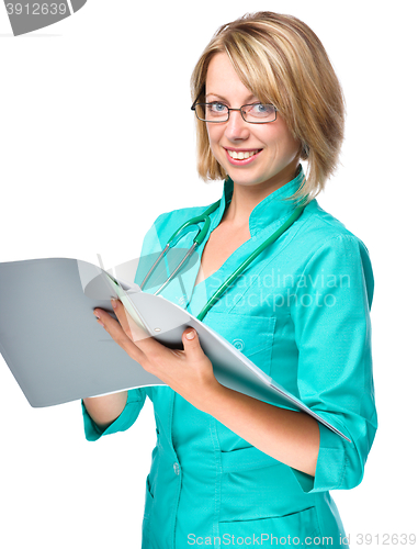 Image of Portrait of a woman wearing doctor uniform