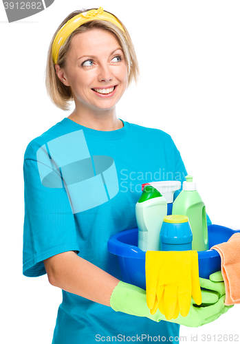 Image of Young woman as a cleaning maid