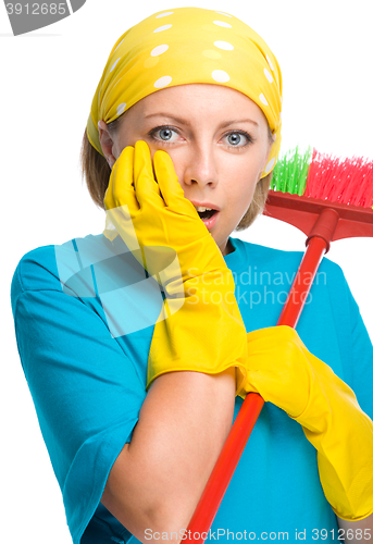 Image of Young woman as a cleaning maid