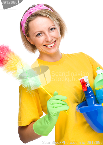 Image of Young woman as a cleaning maid