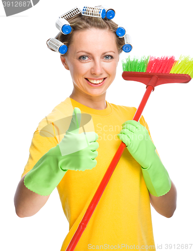 Image of Young woman as a cleaning maid