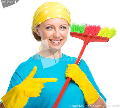 Image of Young woman as a cleaning maid