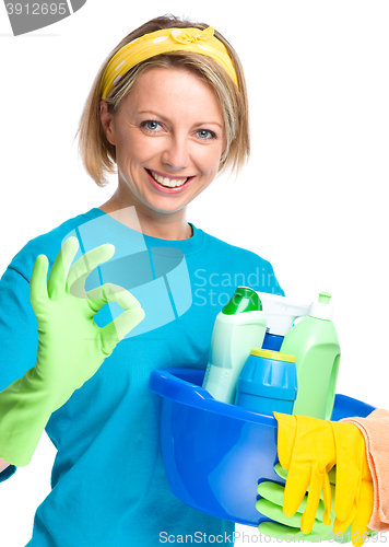 Image of Young woman as a cleaning maid