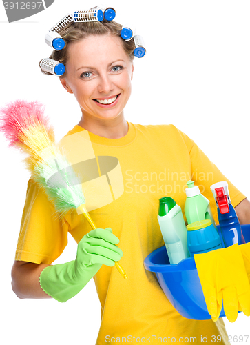 Image of Young woman as a cleaning maid