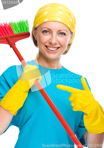 Image of Young woman as a cleaning maid