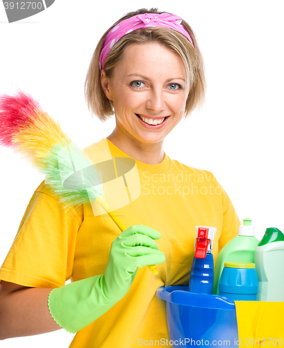 Image of Young woman as a cleaning maid