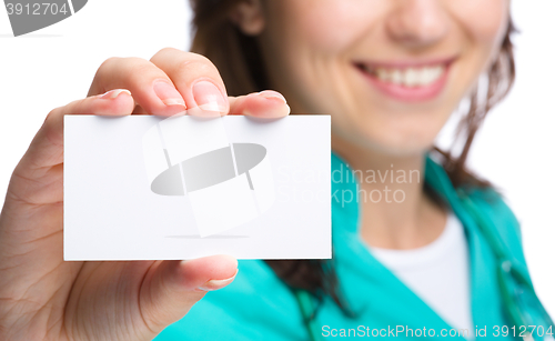 Image of Doctor is showing her business card