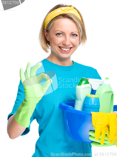 Image of Young woman as a cleaning maid