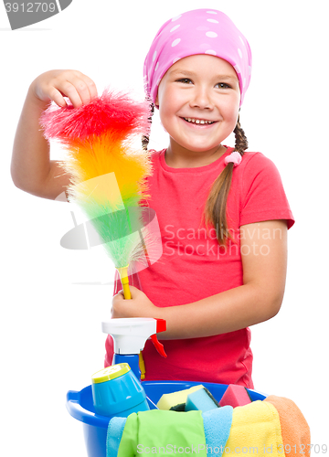 Image of Young girl is dressed as a cleaning maid