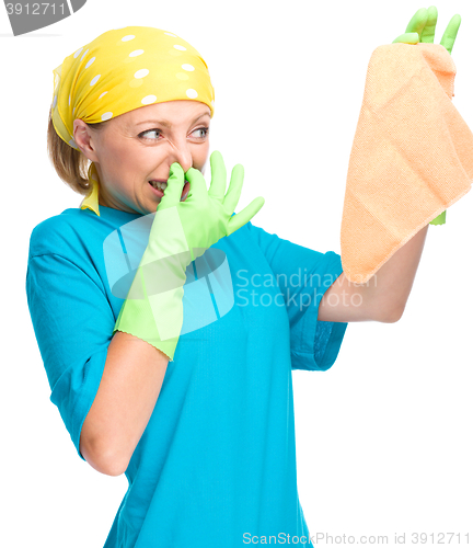 Image of Young woman as a cleaning maid