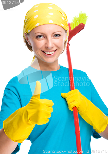 Image of Young woman as a cleaning maid