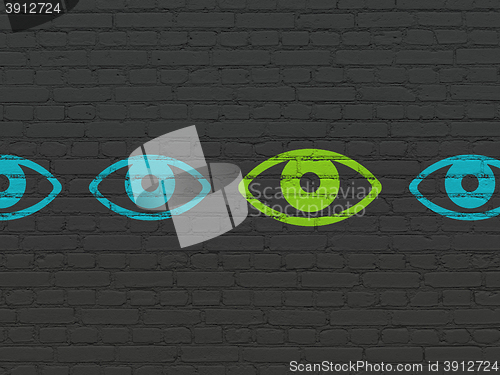 Image of Privacy concept: eye icon on wall background