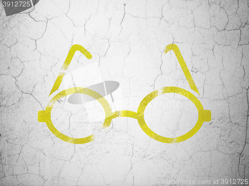 Image of Science concept: Glasses on wall background