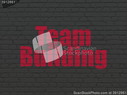 Image of Business concept: Team Building on wall background