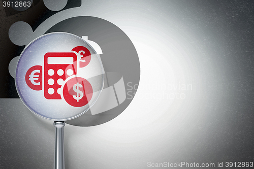Image of Marketing concept:  Calculator with optical glass on digital background