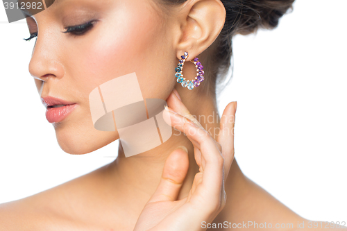 Image of close up of beautiful woman face with earring