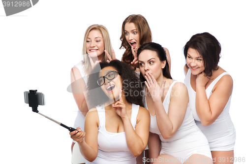 Image of group of happy women taking selfie by smartphoone