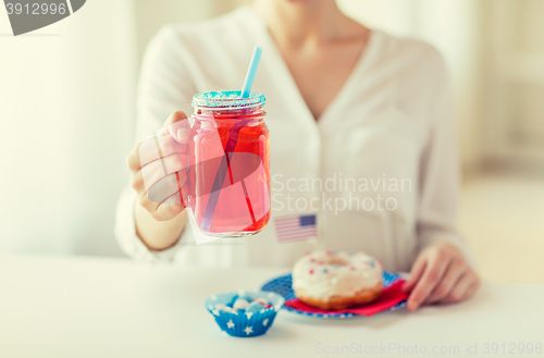 Image of woman celebrating american independence day