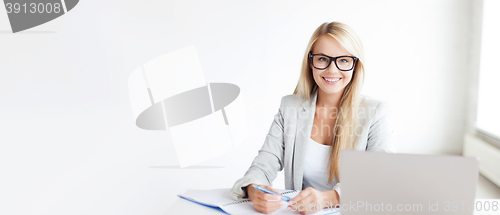 Image of businesswoman with documents