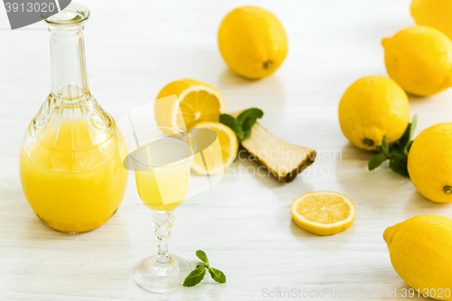 Image of Italian traditional liqueur limoncello with lemon