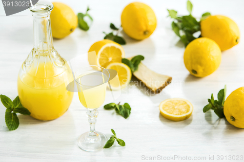 Image of Italian traditional liqueur limoncello with lemon