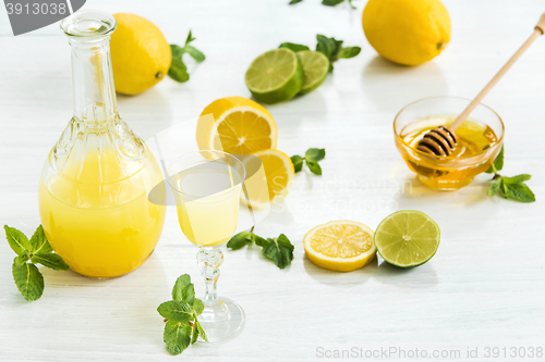 Image of Italian traditional liqueur limoncello with lemon