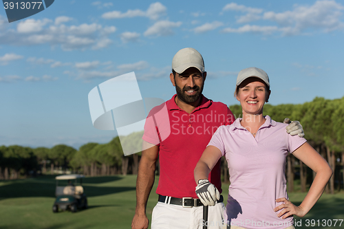 Image of portrait of couple on golf course